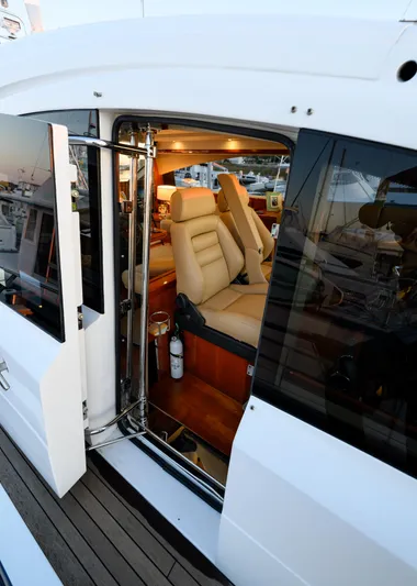 Endless Summer Yacht Photos Pics 2006 Princess V65 yacht interior with luxurious seating and modern design.