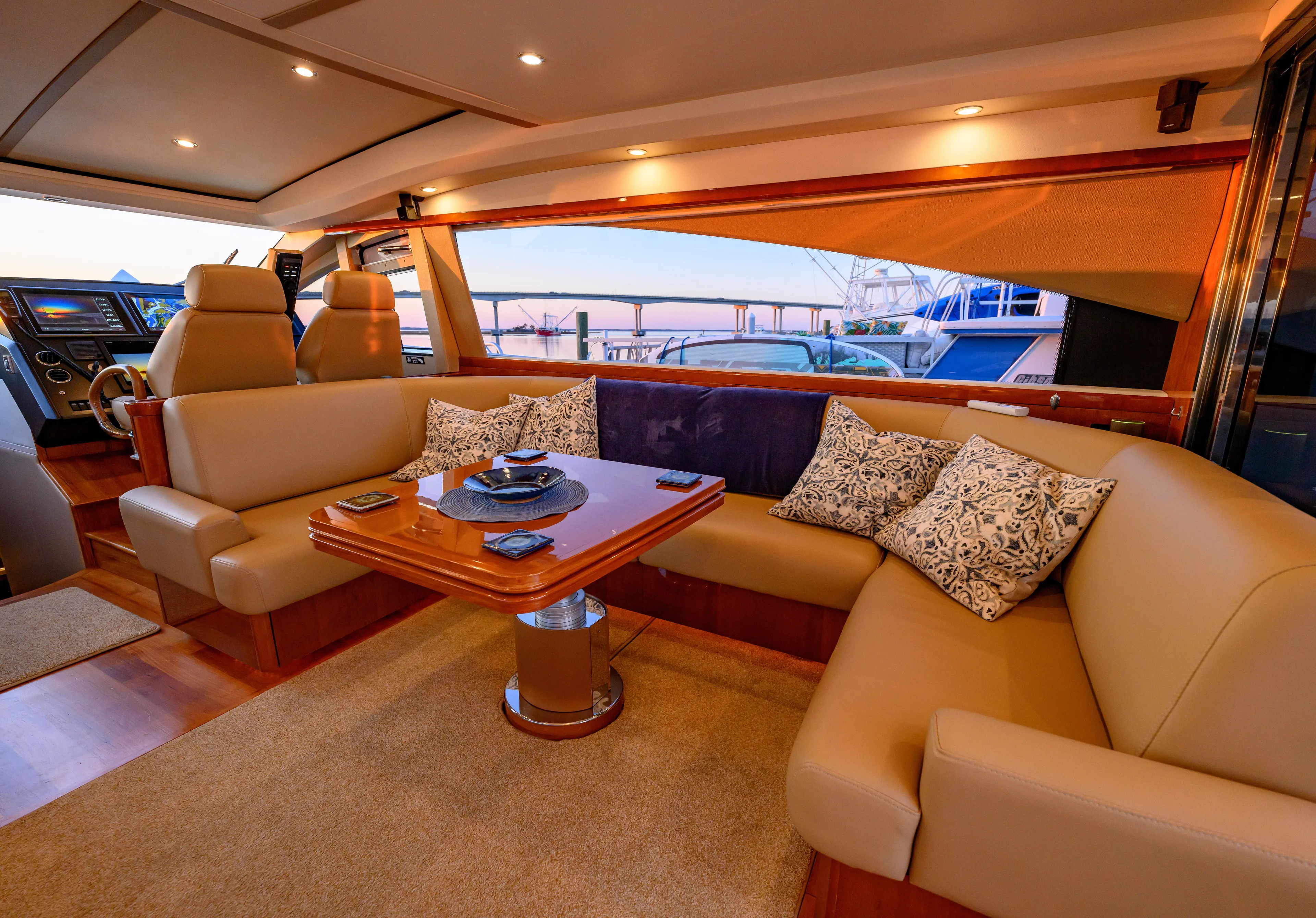 Endless Summer Yacht Photos Pics Luxurious interior of a 2006 Princess V65 yacht with elegant seating and decor.