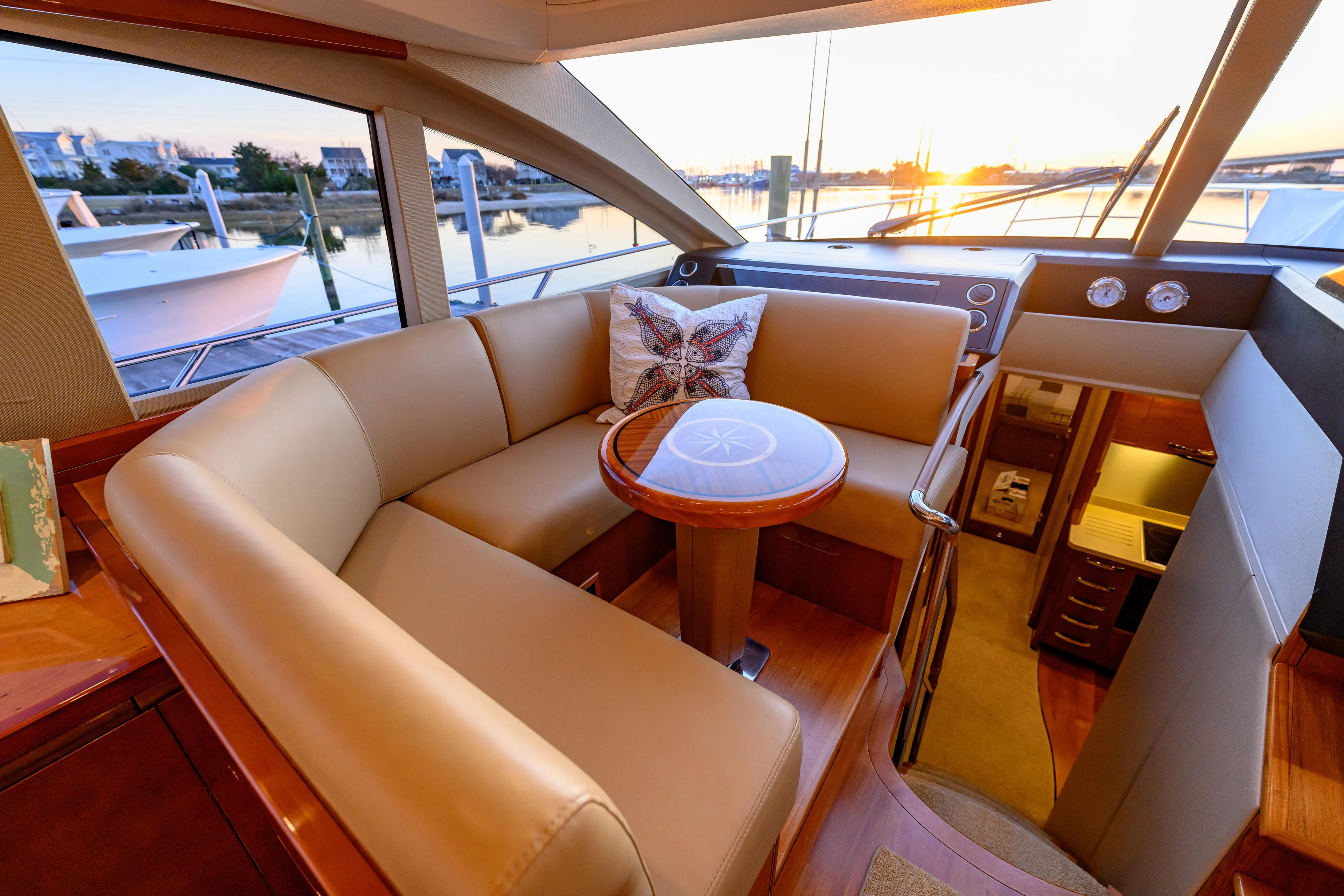 Endless Summer Yacht Photos Pics Luxurious 2006 Princess V65 yacht interior with elegant seating and sunset view.