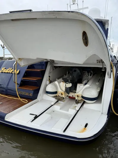 Endless Summer Yacht Photos Pics 2006 Princess V65 yacht with open stern garage and stored tender.