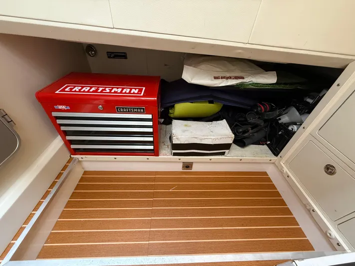 Endless Summer Yacht Photos Pics Storage compartment with Craftsman toolbox on a 2006 Princess V65 yacht.