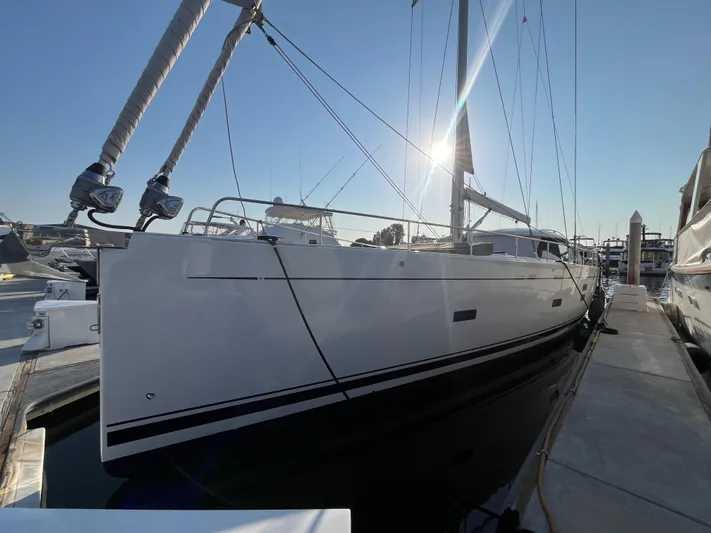 Crosswind Yacht Photos Pics 2016 Moody 54 DS yacht docked at marina, sunlit sails.