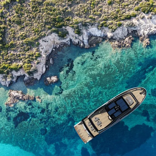  Yacht Photos Pics Aerial view of Soyaslan Dionysos 35 yacht near rocky coastline, 2025 model.
