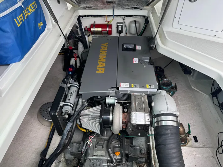 Change Of Pace Yacht Photos Pics Engine compartment of a 2008 Back Cove 29 Hardback boat with Yanmar engine.