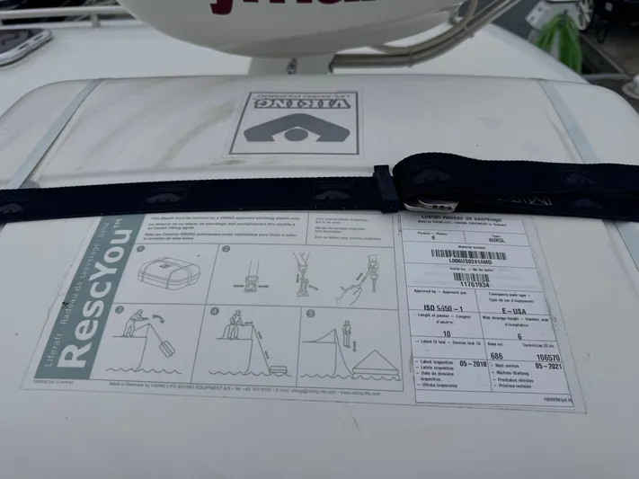Change Of Pace Yacht Photos Pics Safety instructions on a 2008 Back Cove 29 Hardback boat, featuring a Viking RescYou liferaft.