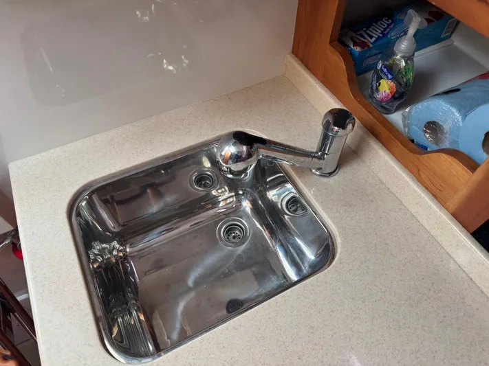 Change Of Pace Yacht Photos Pics Stainless steel sink in 2008 Back Cove 29 Hardback boat kitchen area.