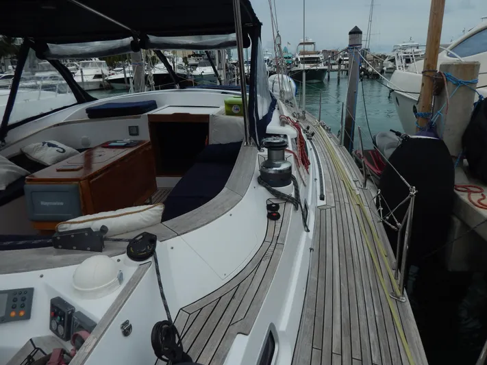  Yacht Photos Pics North Wind 58 sailboat, 2002 model, docked at marina with teak deck and cockpit view.