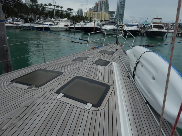  Yacht Photos Pics Deck of 2002 North Wind 58 yacht docked in marina with other boats.