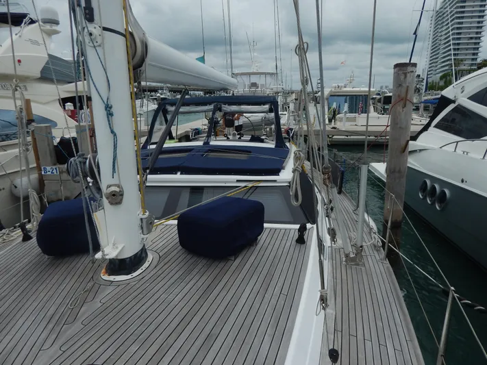  Yacht Photos Pics 2002 North Wind 58 sailboat docked at a marina, featuring a spacious deck.