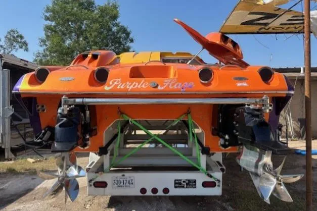  Yacht Photos Pics 2008 Nor-Tech 3600 Supercat "Purple Haze" powerboat on trailer, rear view.