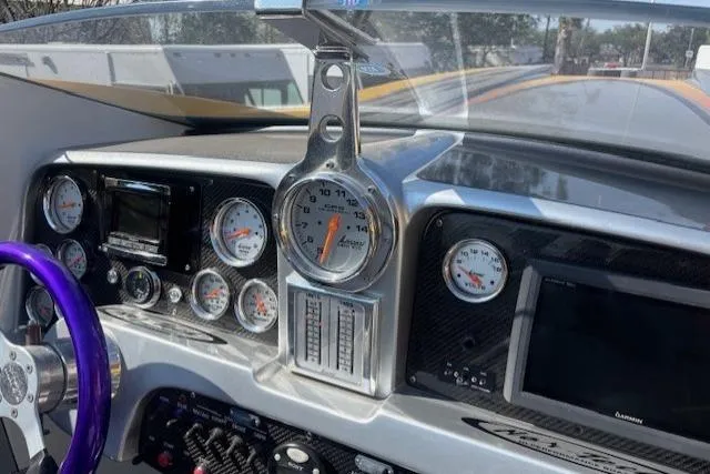  Yacht Photos Pics Dashboard of a 2008 Nor-Tech 3600 Supercat with gauges and controls.