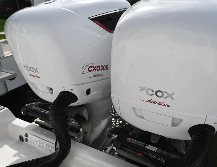  Yacht Photos Pics Twin Cox diesel outboard engines on a 2013 Everglades 325 Center Console boat.