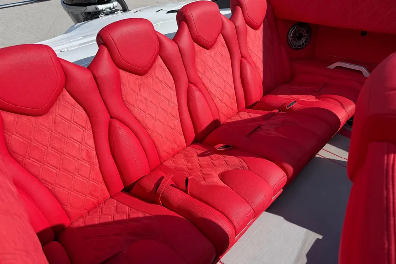  Yacht Photos Pics Luxurious red seating in a 2022 Doug Wright 320 boat, featuring diamond stitching.