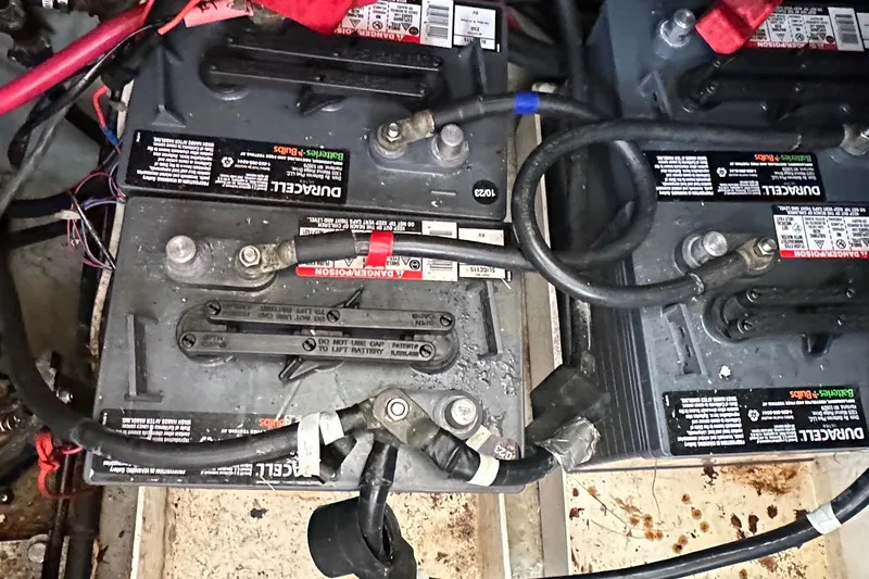 Chapter 2 Yacht Photos Pics Batteries in a 1998 Mainship 350 Trawler, showing wiring and connections.