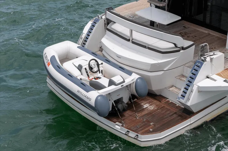  Yacht Photos Pics Galeon 500 Fly 2020 yacht with Williams tender on water, featuring spacious deck and seating.