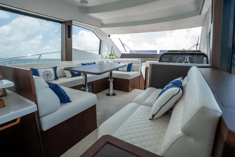  Yacht Photos Pics Luxurious interior of 2020 Galeon 500 Fly yacht with elegant seating and nautical decor.