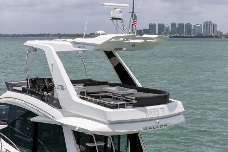  Yacht Photos Pics 2020 Galeon 500 Fly yacht on water with city skyline in background.