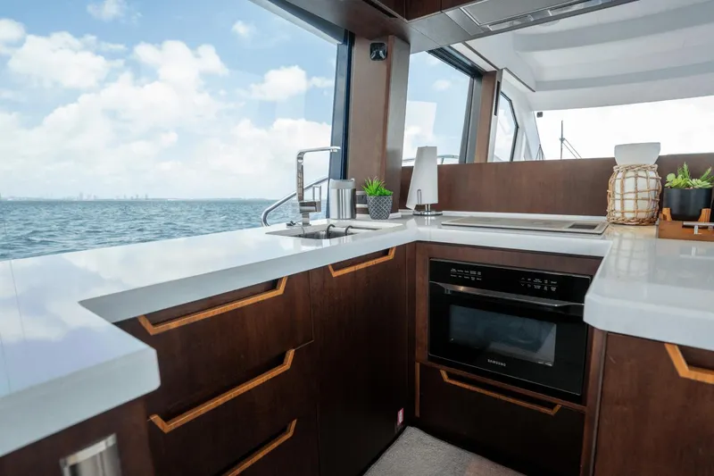  Yacht Photos Pics Modern kitchen interior on 2020 Galeon 500 Fly yacht with ocean view.