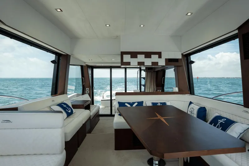  Yacht Photos Pics Luxurious interior of 2020 Galeon 500 Fly yacht with ocean view and elegant seating.
