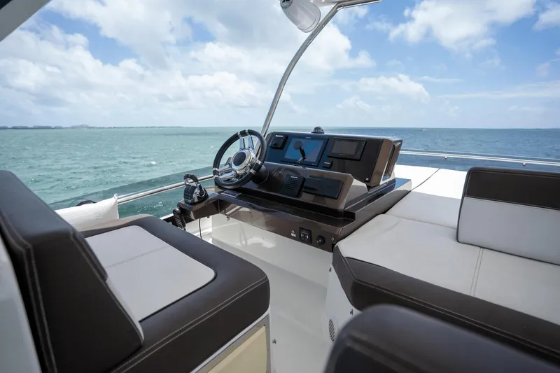  Yacht Photos Pics Helm of 2020 Galeon 500 Fly yacht with ocean view and modern controls.