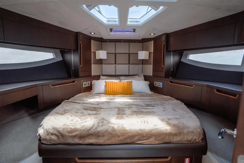 Yacht Photos Pics Luxurious bedroom interior of 2020 Galeon 500 Fly yacht with skylight and modern design.