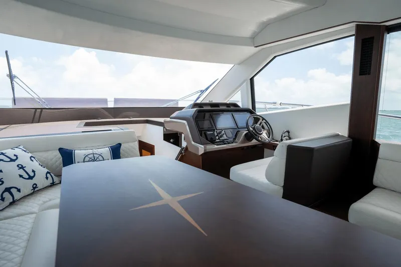  Yacht Photos Pics Interior of 2020 Galeon 500 Fly yacht with modern helm and seating area.