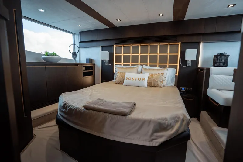  Yacht Photos Pics Luxurious bedroom interior of 2020 Galeon 500 Fly yacht with modern design elements.