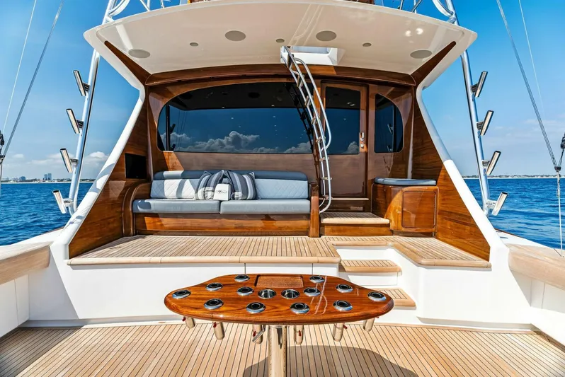 Rachel Anne Yacht Photos Pics Luxurious 2022 Viking 80 yacht deck with seating and ocean view.