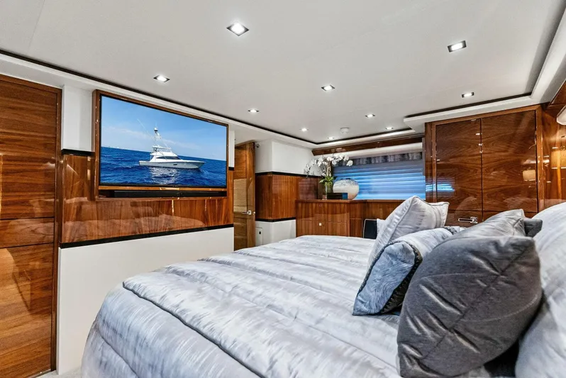 Rachel Anne Yacht Photos Pics Luxurious interior of 2022 Viking 80 yacht with elegant wood finishes and modern amenities.