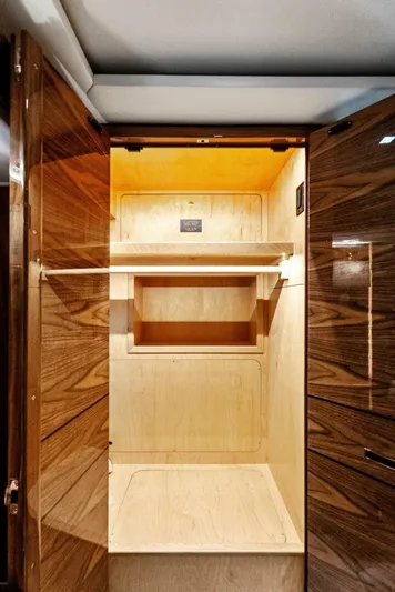 Rachel Anne Yacht Photos Pics Luxurious wooden interior of 2022 Viking 80 yacht closet.