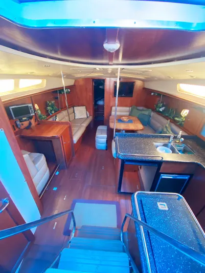 Pending Yacht Photos Pics Luxurious interior of 2012 Hunter 50 Aft Cockpit yacht with modern amenities and seating.