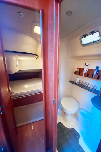 Pending Yacht Photos Pics 2012 Hunter 50 Aft Cockpit yacht interior with bathroom and sleeping area.