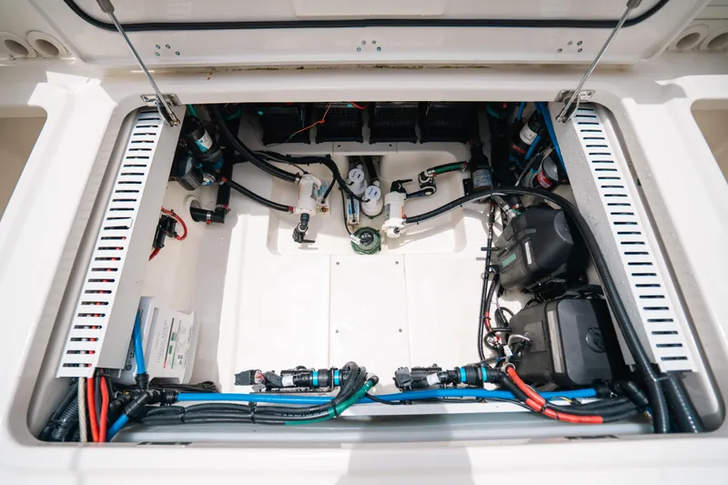  Yacht Photos Pics 2019 Boston Whaler 330 Outrage engine compartment with wiring and components.
