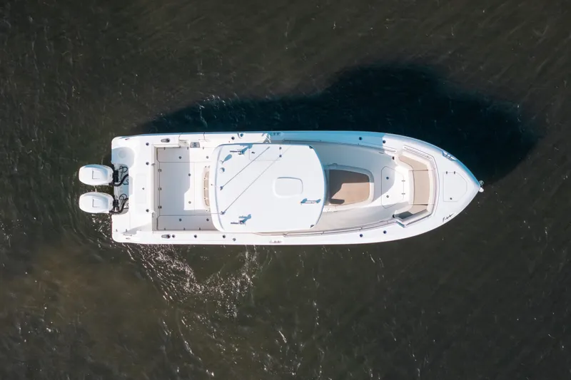  Yacht Photos Pics Aerial view of 2019 Boston Whaler 330 Outrage boat on water.