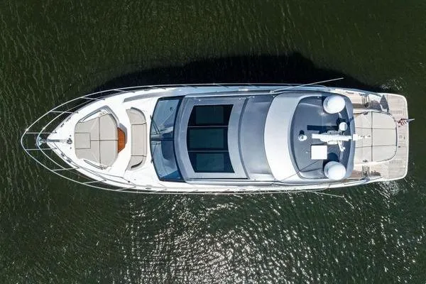 Endless Summer Yacht Photos Pics Aerial view of 2020 Princess V55 yacht on calm water.