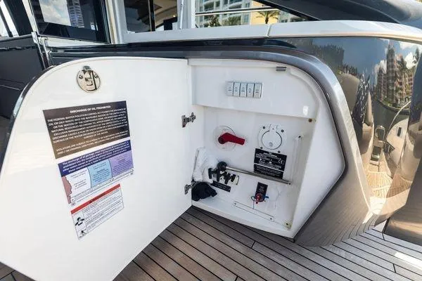 Endless Summer Yacht Photos Pics 2020 Princess V55 yacht control panel with open compartment on deck.