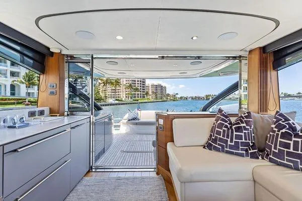Endless Summer Yacht Photos Pics Luxurious interior of 2020 Princess V55 yacht with waterfront view and modern amenities.