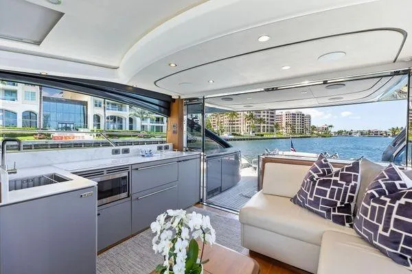 Endless Summer Yacht Photos Pics Luxurious 2020 Princess V55 yacht interior with modern kitchen and waterfront view.