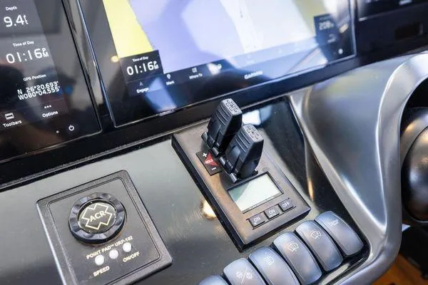 Endless Summer Yacht Photos Pics Control panel of a 2020 Princess V55 yacht with navigation and control switches.