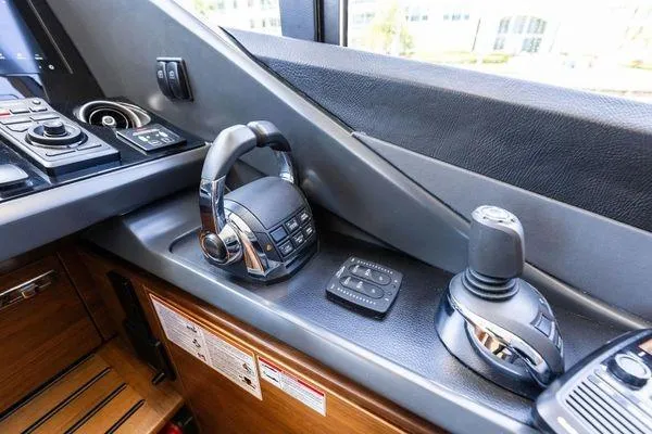 Endless Summer Yacht Photos Pics Control panel of a 2020 Princess V55 yacht, featuring advanced navigation equipment.