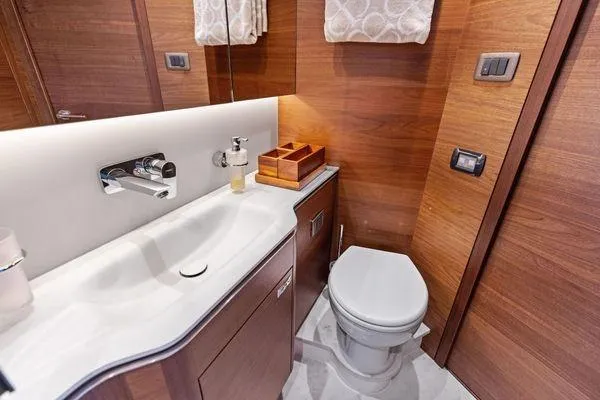 Endless Summer Yacht Photos Pics Luxurious bathroom in 2020 Princess V55 yacht with modern fixtures and wooden accents.
