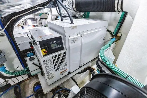 Endless Summer Yacht Photos Pics Engine room of 2020 Princess V55 yacht with generator and wiring.