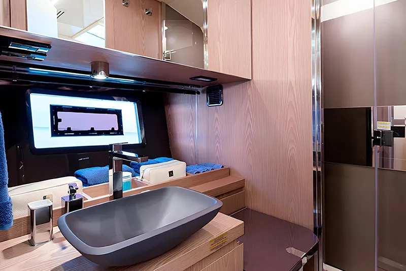  Yacht Photos Pics Modern bathroom interior of 2023 Invictus TT460 yacht with sleek design and elegant fixtures.