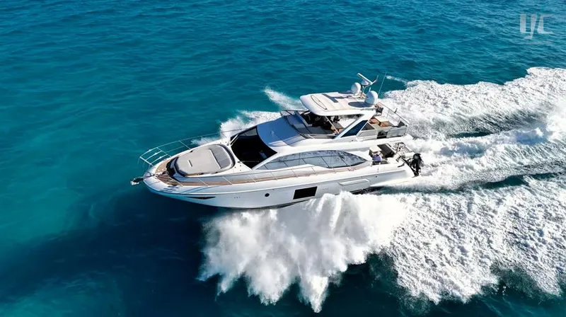 Resilience Yacht Photos Pics Azimut 55 yacht cruising on clear blue water, 2021 model.