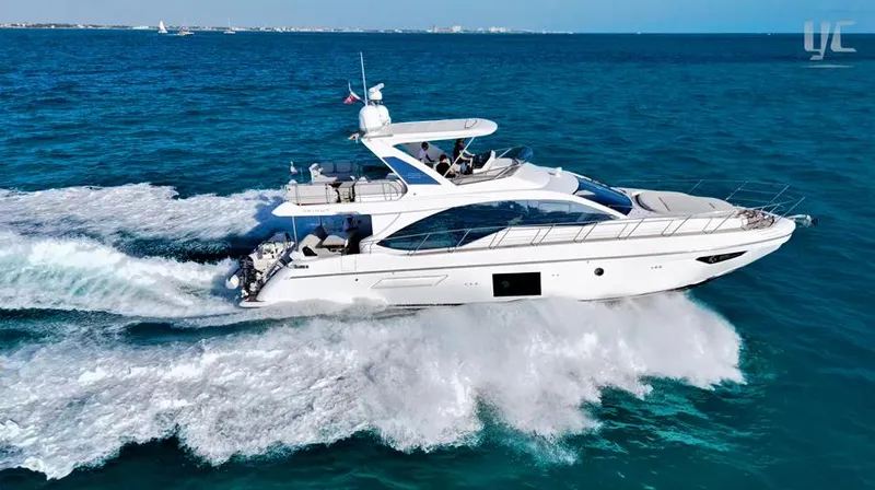 Resilience Yacht Photos Pics 2021 Azimut 55 yacht cruising on open blue sea.