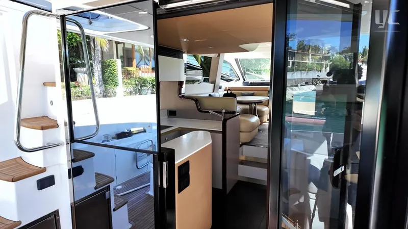 Resilience Yacht Photos Pics Interior view of 2021 Azimut 55 yacht, featuring modern design and luxurious seating.