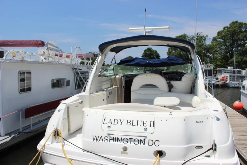  Yacht Photos Pics 2003 Sea Ray 380 Sundancer docked, rear view, with "Lady Blue II" nameplate.