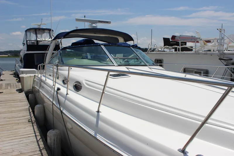  Yacht Photos Pics 2003 Sea Ray 380 Sundancer yacht docked at marina under clear sky.
