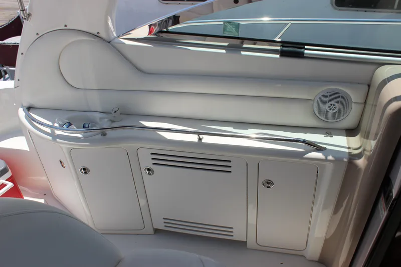  Yacht Photos Pics Interior view of a 2003 Sea Ray 380 Sundancer boat, featuring white cabinetry and speaker.