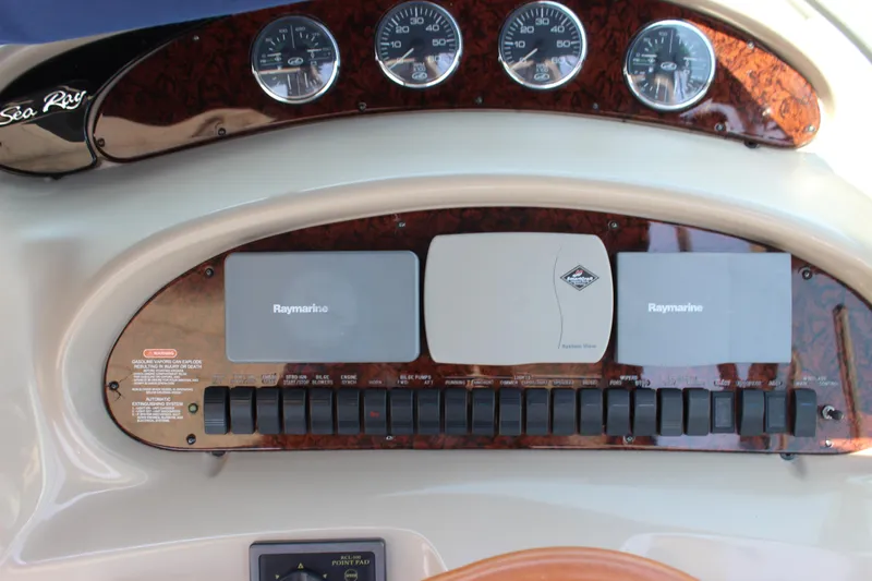  Yacht Photos Pics Control panel of a 2003 Sea Ray 380 Sundancer with Raymarine navigation equipment.